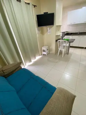 Uma televisão e/ou sistema de entretenimento em Pousada Bella Bombinhas - Pé na areia