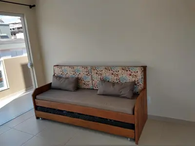 Uma área de estar em Pousada Bella Bombinhas - Pé na areia