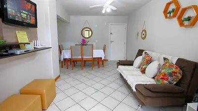 Uma televisão e/ou sistema de entretenimento em 1075 - Praia de Bombinhas locação de temporada