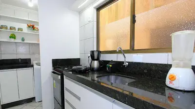 A cozinha ou kitchenette de 1075 - Praia de Bombinhas locação de temporada