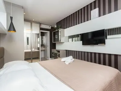 A planta de Boulevard 205A - Excelente apartamento em condomínio de luxo no centro de Bombinhas - Piscina - Jacuzzi - Academia - Portaria 24h.