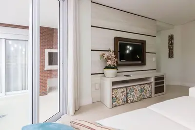 A planta de Boulevard 211B - Excelente apartamento em condomínio de luxo no centro de Bombinhas - Piscina - Jacuzzi - Academia - Portaria 24h.