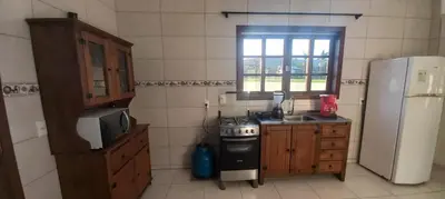 A planta de SOBRADO COM PISCINA A 500 METROS DA PRAIA EM MARISCAL BOMBINHAS Rutilio N 350