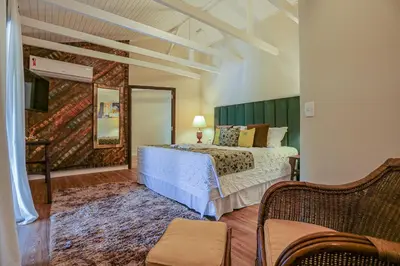 Uma cama ou camas num quarto em Estaleiro Guest House