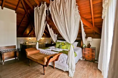 Uma cama ou camas num quarto em Estaleiro Guest House