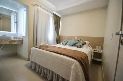 Uma cama ou camas num quarto em Pousada Retiro das Ilhas