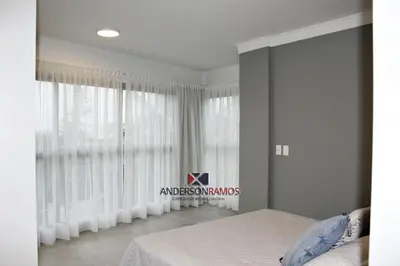 Uma cama ou camas num quarto em 1003 Residencial Positano Apto 204 - Quatro Ilhas