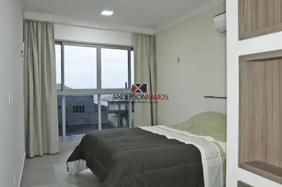 Uma cama ou camas num quarto em 1005 Residencial Positano Apto 203 - Quatro Ilhas
