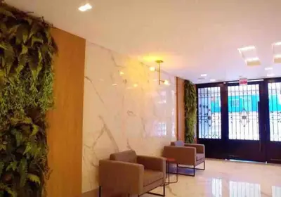Uma área de estar em 1005 Residencial Positano Apto 203 - Quatro Ilhas