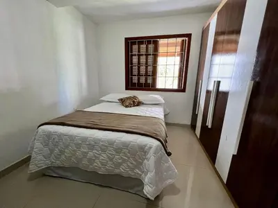 Uma cama ou camas num quarto em Casa a 50 M do Mar Para Recarregar as Energias
