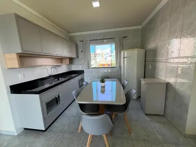 A cozinha ou kitchenette de Aprecie Mariscal Nesta Hospedagem a 150 M do Mar - V4