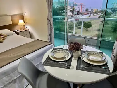 Uma cama ou camas num quarto em Estúdio a 150 metros da Praia de Mariscal - V05