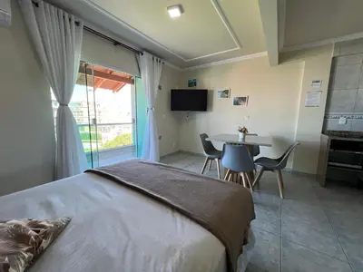 Uma televisão e/ou sistema de entretenimento em Estúdio Com Vista Para o Mar de Mariscal - V07