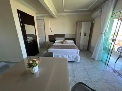 Uma cama ou camas num quarto em Estúdio Com Vista Para o Mar de Mariscal - V07
