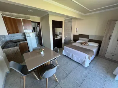 Uma cama ou camas num quarto em Estúdio Com Vista Para o Mar de Mariscal - V07