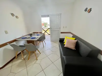 Uma área de estar em Combinação de Praia e Piscina - S1