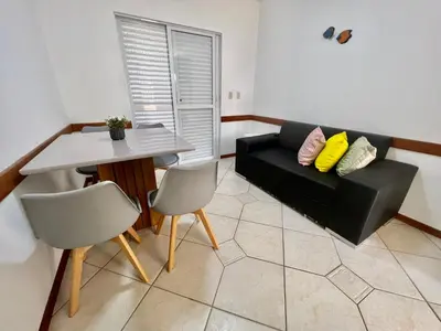Uma área de estar em Combinação de Praia e Piscina - S1