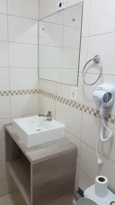 Uma casa de banho em Novo Lar England Quadra Mar Meia Praia