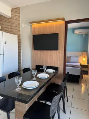 Uma televisão e/ou sistema de entretenimento em Residencial Golfinho - Palmas, Apto 02
