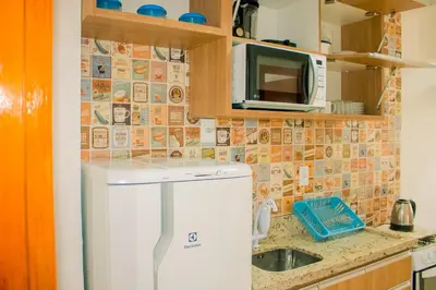 A cozinha ou kitchenette de Apart Hotel Canto Grande
