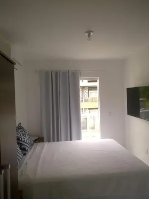 Uma cama ou camas num quarto em Residencial Farol das Conchas