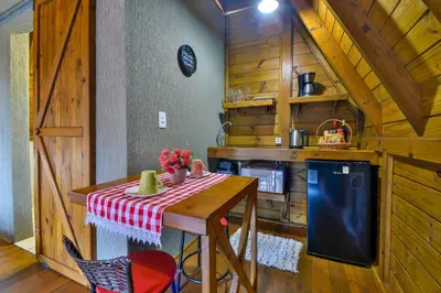 A cozinha ou kitchenette de Chalé Suiço Bombinhas