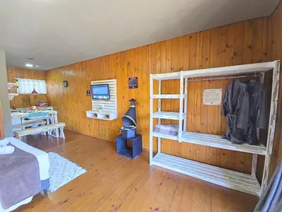 Uma cama ou camas num quarto em Chalé Suiço Bombinhas