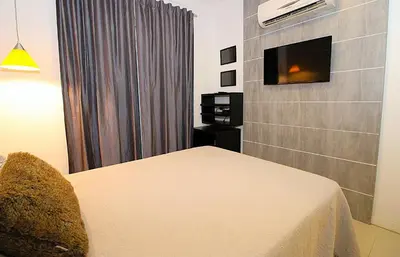 Uma cama ou camas num quarto em 1061 - Excelente Cobertura com Hidromassagem