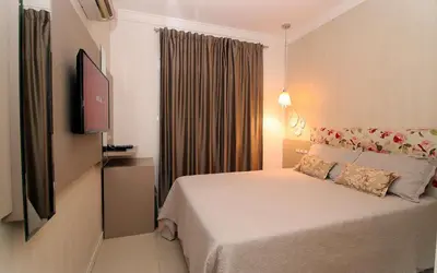 Uma cama ou camas num quarto em 1061 - Excelente Cobertura com Hidromassagem