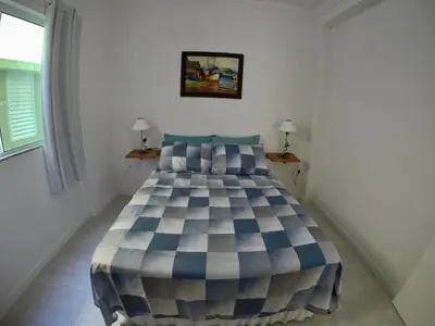 Uma cama ou camas num quarto em Apartamento Praia há 2min para 4 pessoas