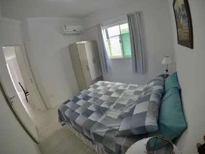 Uma cama ou camas num quarto em Apartamento Praia há 2min para 4 pessoas