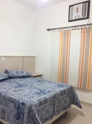 Uma cama ou camas num quarto em RESIDENCIAL ANNABEL APTO 03
