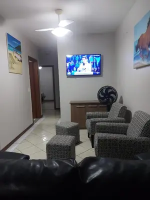 Uma televisão e/ou sistema de entretenimento em Ed. Praia de Palmas SC