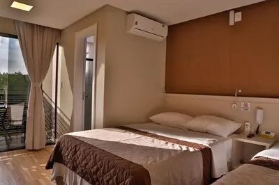 Uma cama ou camas num quarto em Pousada Bella Casa