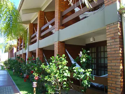 Um jardim no exterior de Pousada Ponta do Lobo