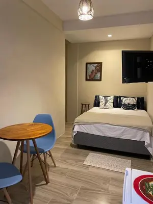 Uma cama ou camas num quarto em Recanto das Acacias