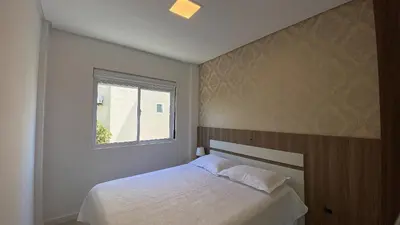 Uma cama ou camas num quarto em Res. Luana