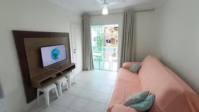 Uma televisão e/ou sistema de entretenimento em Res Nossa Sra dos Navegantes