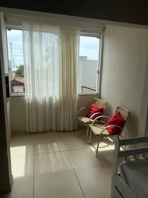 Uma área de estar em Apartamento em Tijucas próximo a praias