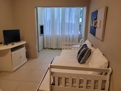 Uma cama ou camas num quarto em Apartamento em Tijucas próximo a praias