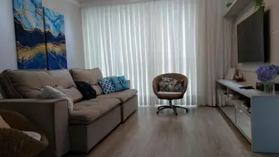 Uma área de estar em Meia Praia Apto Fino Acabamento 3 suítes e 2 garagens