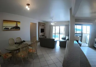 Uma área de estar em Apartamento com VISTA para o MAR no centro de Bombinhas
