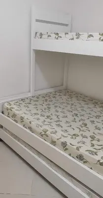 Uma cama ou camas num quarto em EXCELENTE APTO C/VISTA AO MAR