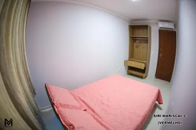 Uma cama ou camas num quarto em Siri Mariscal