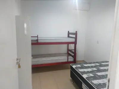Uma cama ou camas num quarto em Casa com piscina