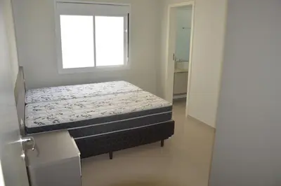 Uma cama ou camas num quarto em Belíssima Casa - Pé na areia - Bombinhas - Canto Grande
