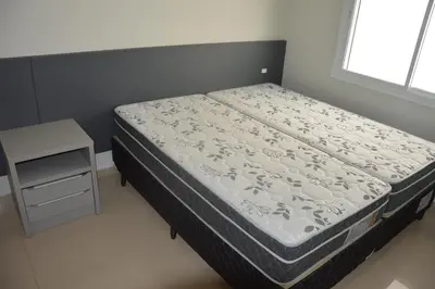 Uma cama ou camas num quarto em Belíssima Casa - Pé na areia - Bombinhas - Canto Grande