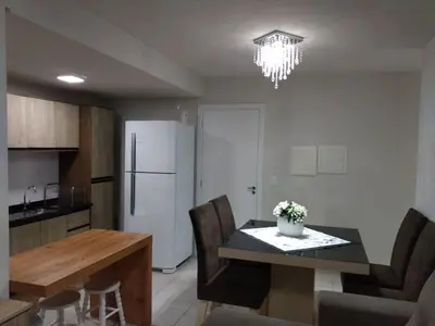 A cozinha ou kitchenette de Apto Vista Atlântico com 2 quartos com Ar Cond Wi-Fi TV SMART e Área de lazer