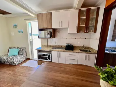 A cozinha ou kitchenette de Acorde Com o Cenário Beira Mar - Coberturinha