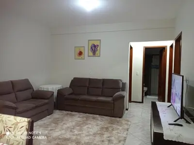 Uma área de estar em Apartamento em Bombinhas